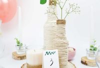 Bottle Blooms: Crafting Eco-Elegant Wedding Centerpieces