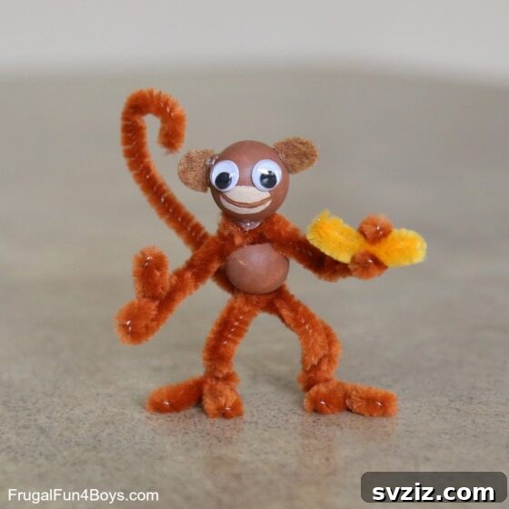 27 Creative Pipe Cleaner Crafts 14 Adorable pipe cleaner monkeys with wooden bead heads, hanging from a branch.