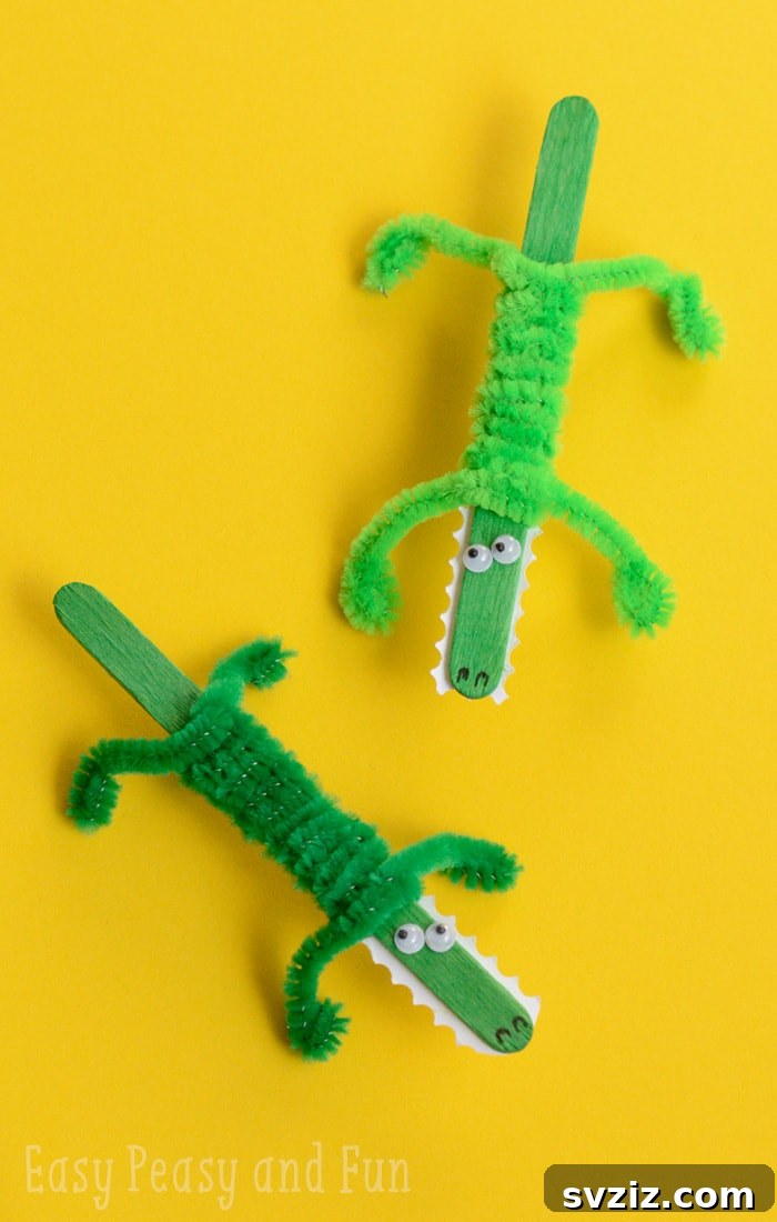 27 Creative Pipe Cleaner Crafts 16 Green crocodile craft made with popsicle sticks and pipe cleaners, featuring zig-zag teeth.