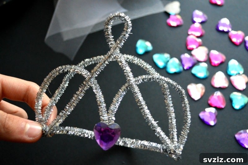 27 Creative Pipe Cleaner Crafts 23 Sparkling DIY pipe cleaner tiara with gems, perfect for dress-up and imaginative play.