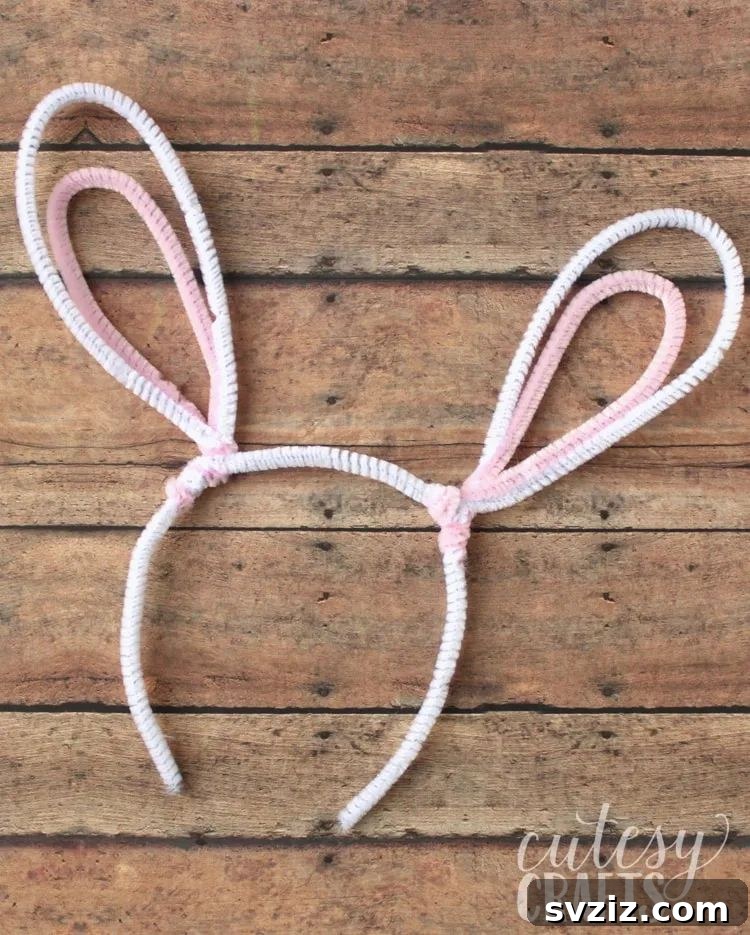 27 Creative Pipe Cleaner Crafts 6 Child wearing a headband with pipe cleaner bunny ears, a cute Easter craft project.