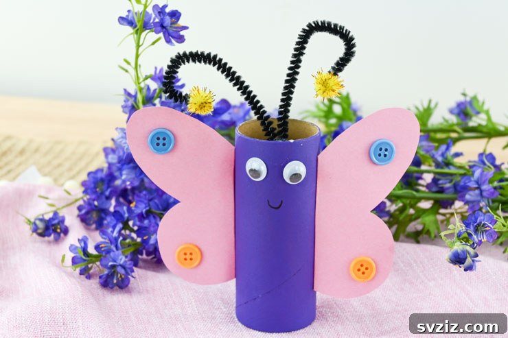 27 Creative Pipe Cleaner Crafts 10 Colorful butterfly craft made from a toilet paper roll and pipe cleaners, decorated with sequins.