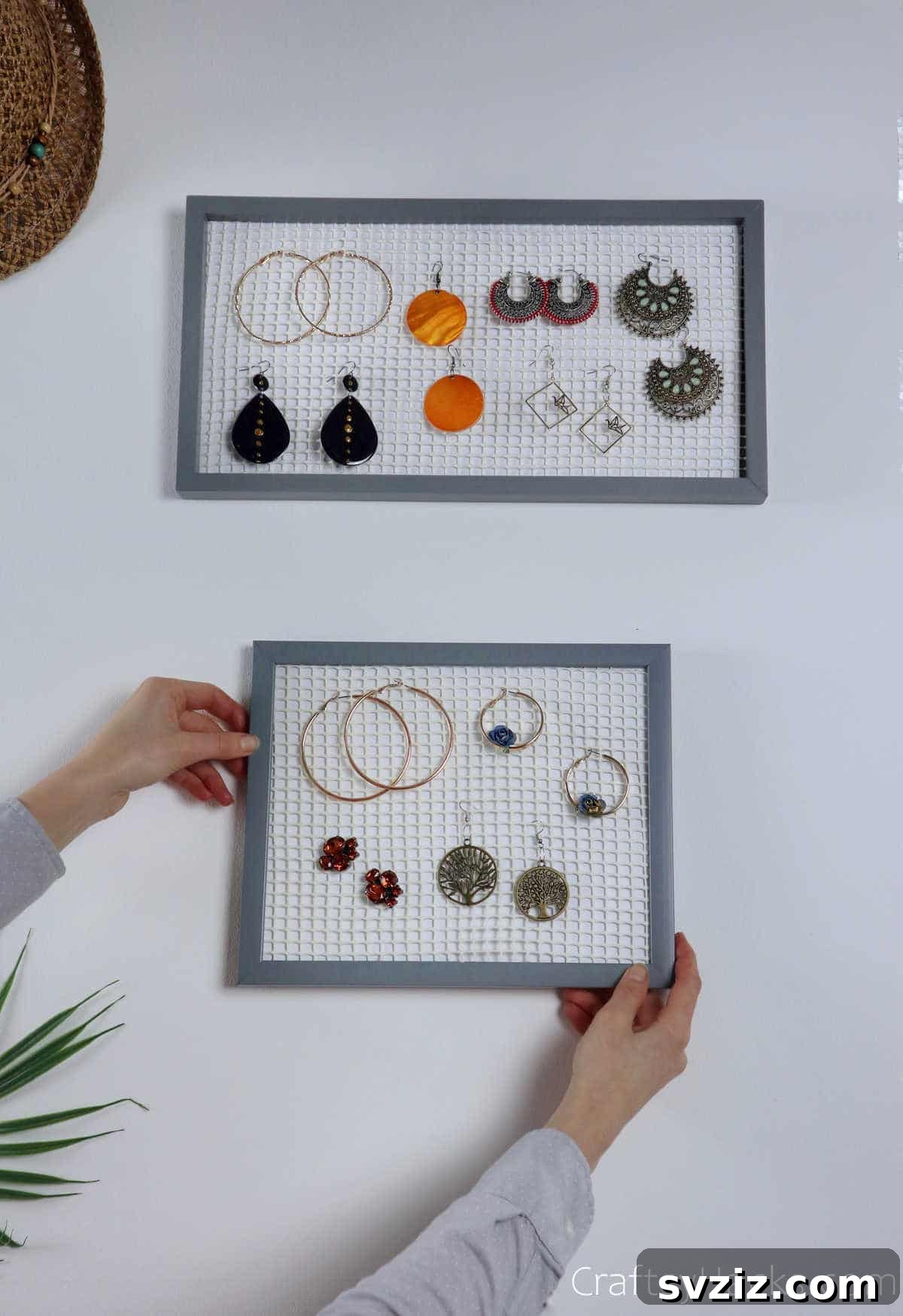 Turn Old Frames into a Chic Earring Organizer 3 Three stylish DIY earring organizers hanging on a wall, adorned with a variety of earrings
