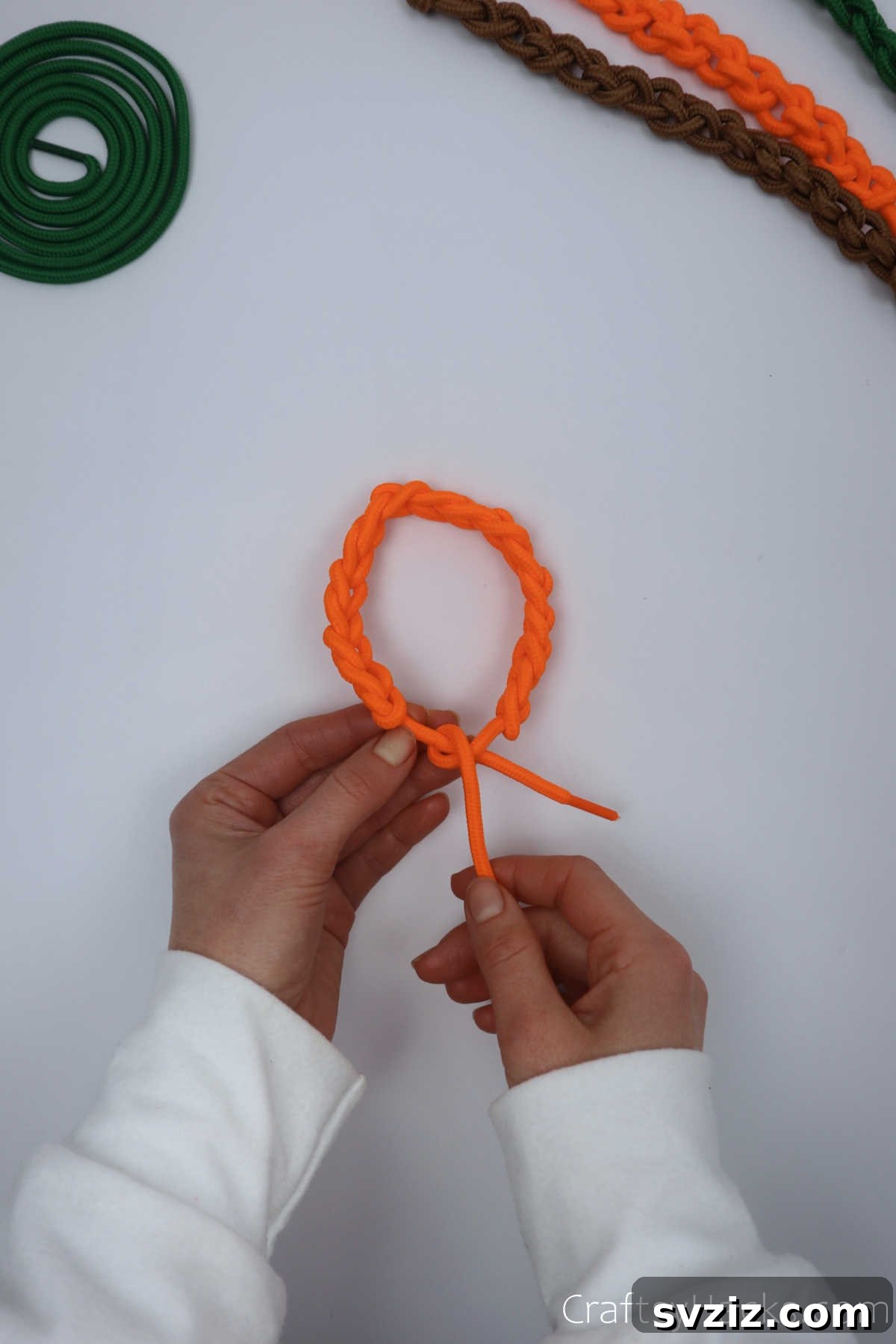 tying knot in bracelet end