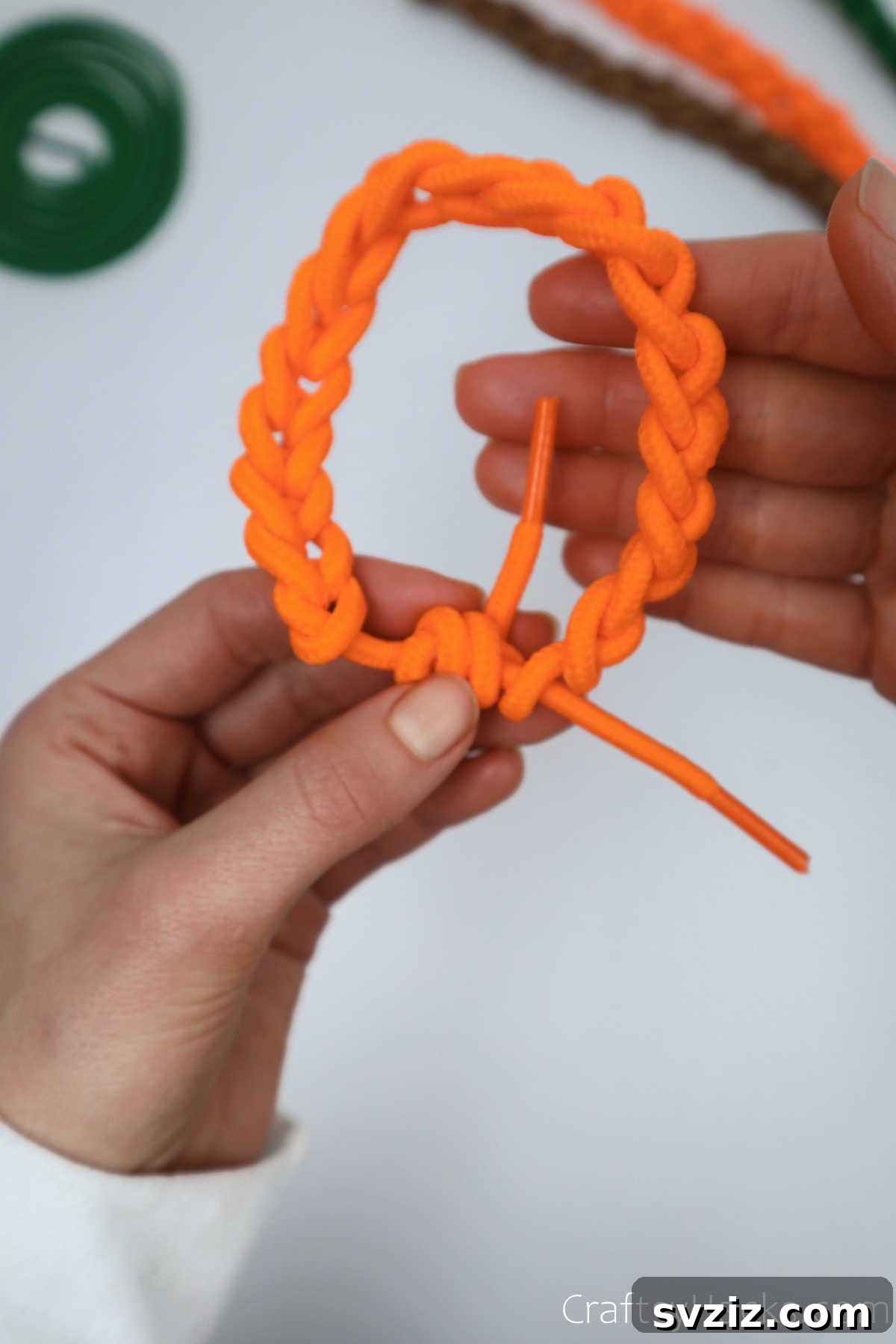 closeup completed orange bracelet