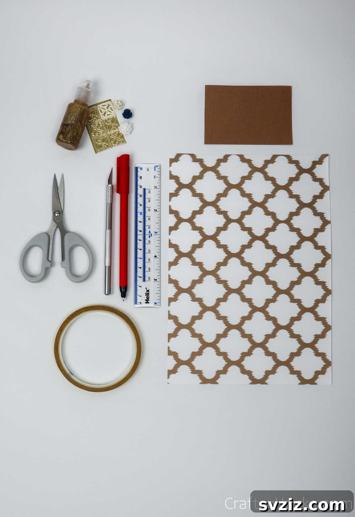 Homemade Touch: Custom Gift Bags 5 Various craft supplies neatly laid out, including paper, tape, scissors, and decorative elements.