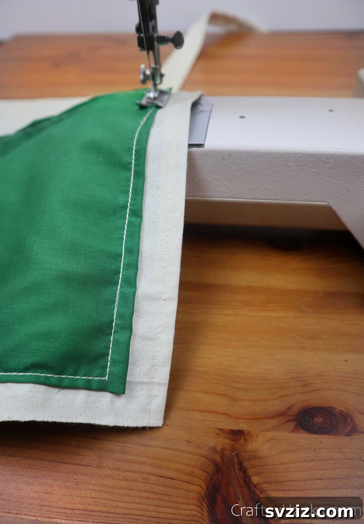 Sewing a pocket onto the main fabric of the caddy