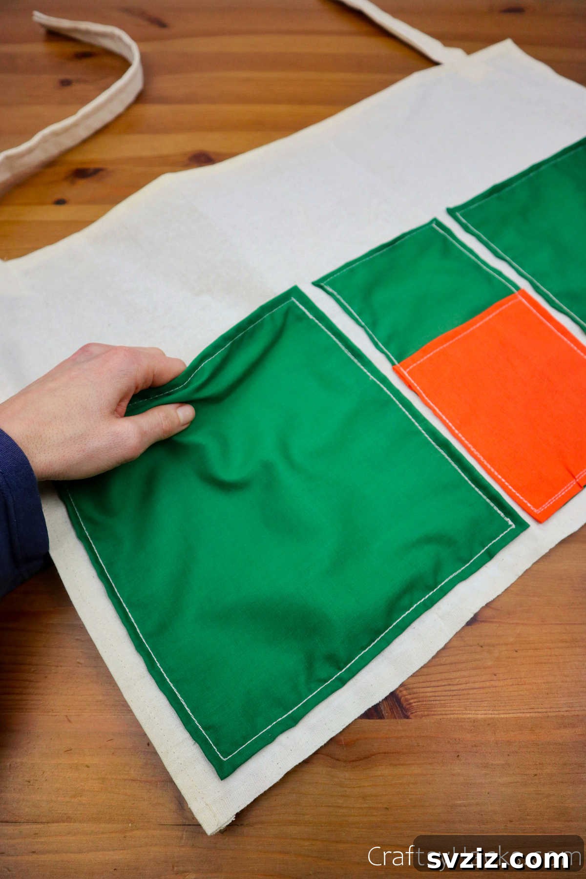 Holding a fabric pocket of the newly finished caddy
