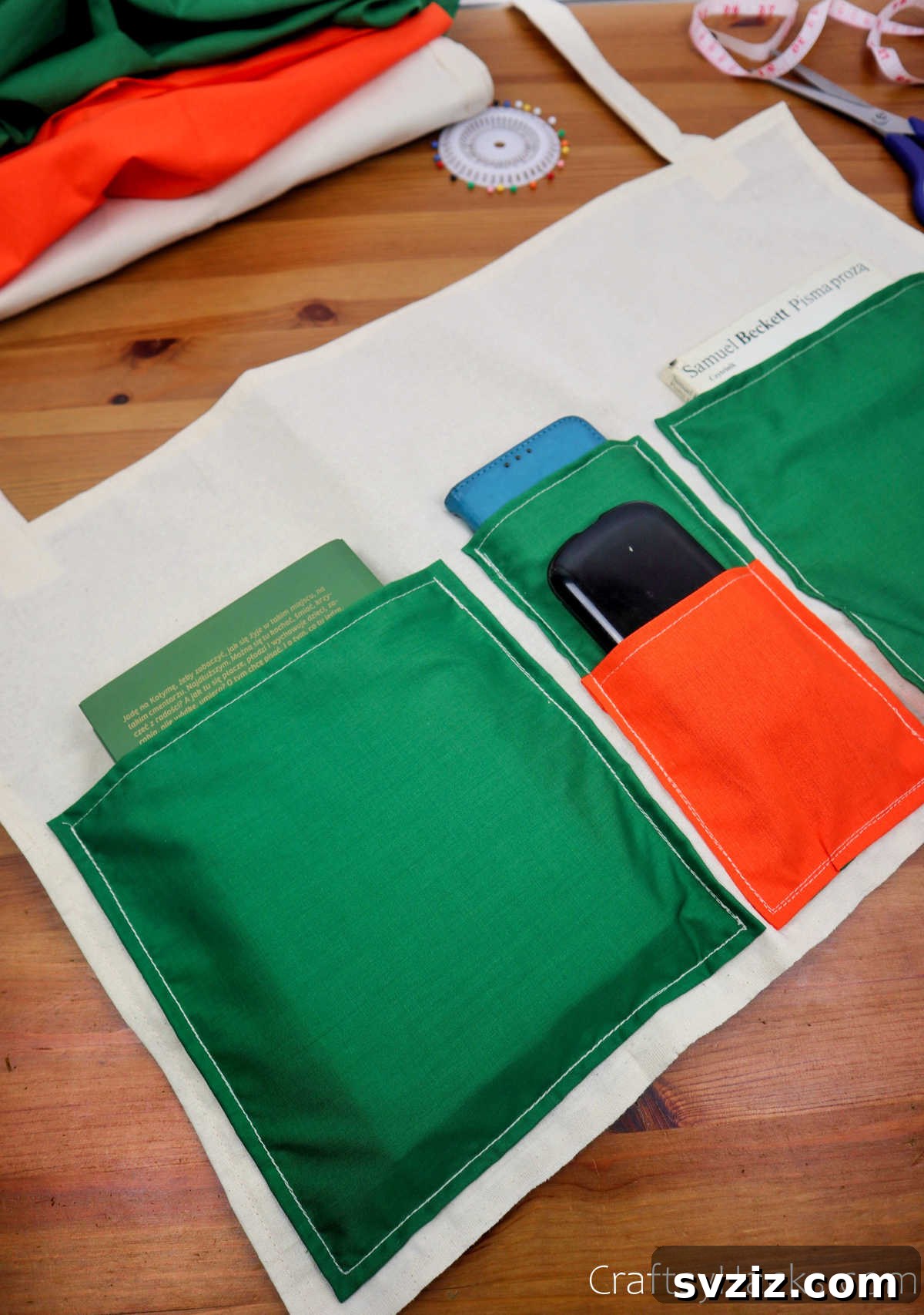 Fabric bedside organizer with vibrant green pockets