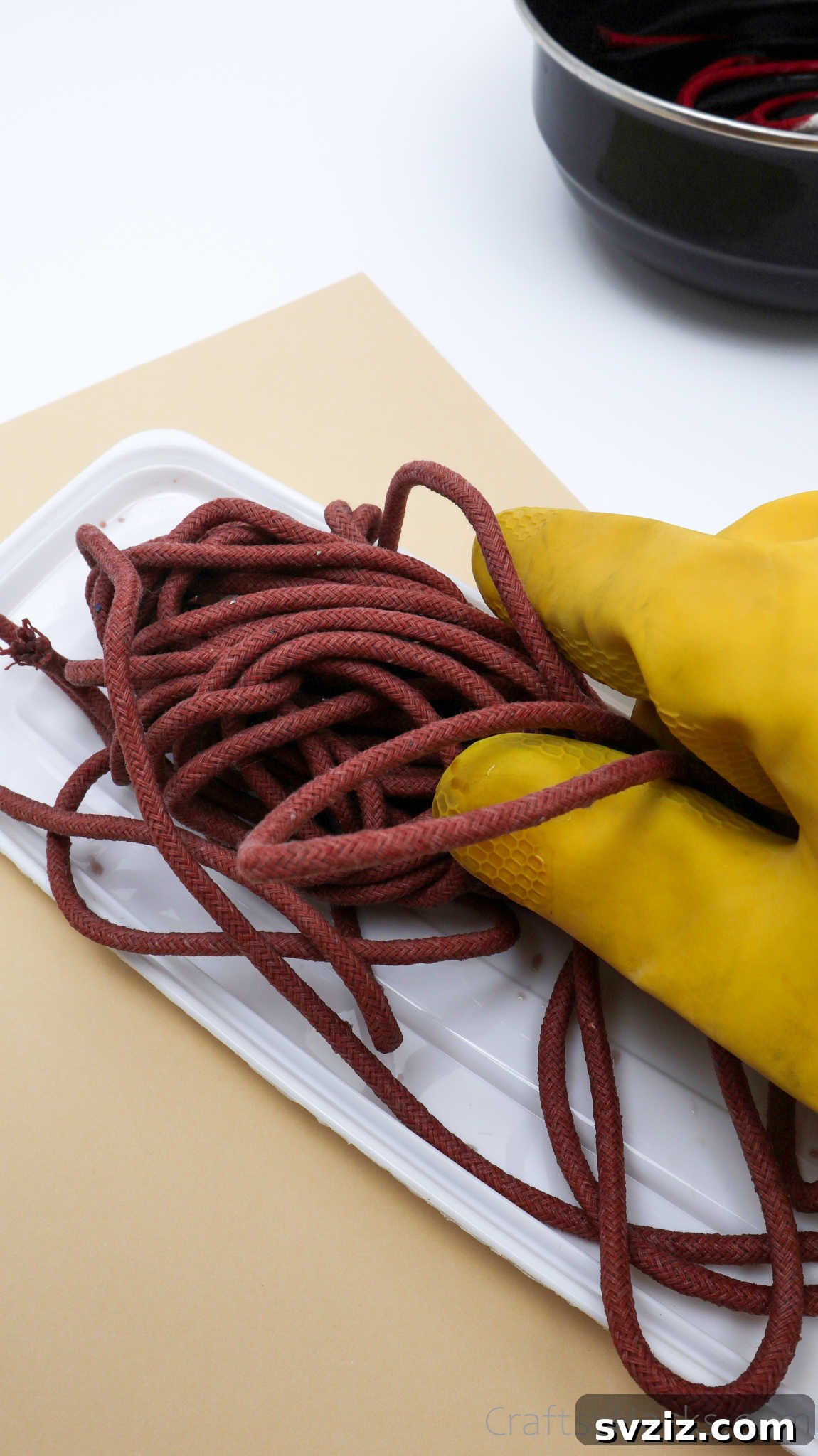 Stylish DIY Rope Basket 11 Gloved Hand Holding Perfectly Red-Dyed Rope