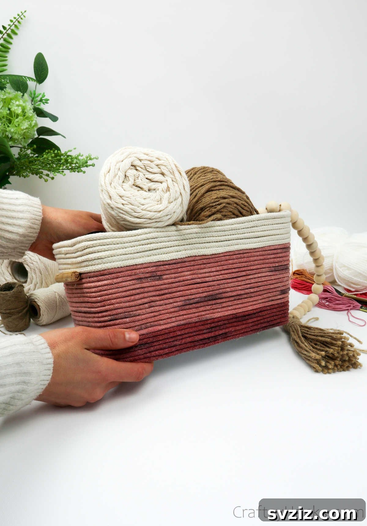 Stylish DIY Rope Basket 3 Holding a Handmade Rope Basket for Practical Storage