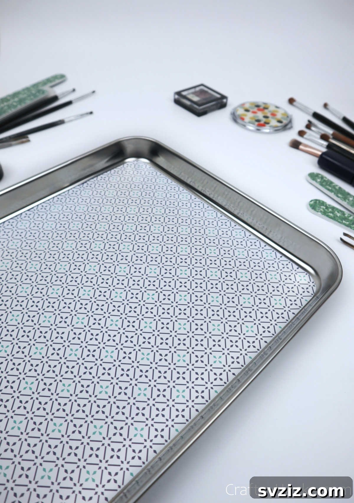 Magnetic tray surrounded by various makeup brushes
