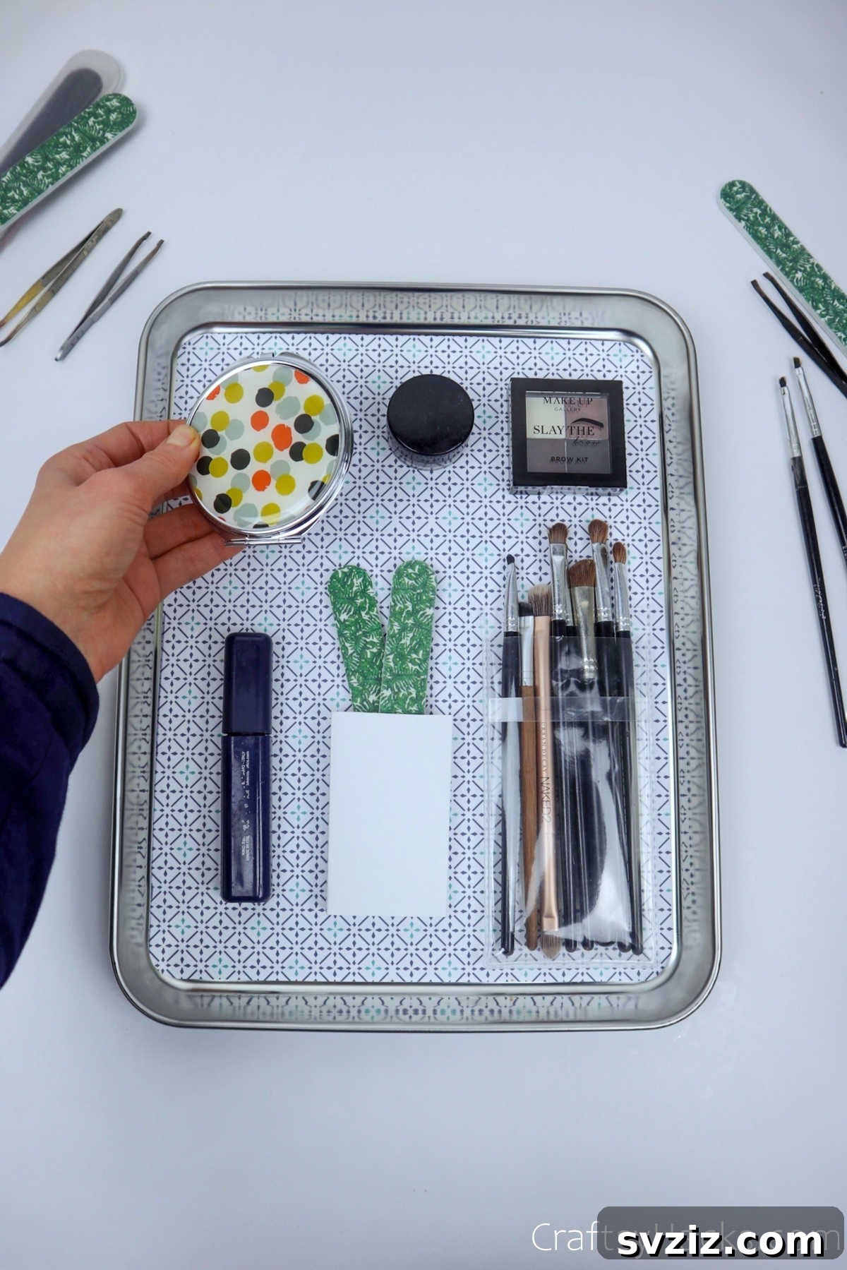 Makeup items neatly arranged on a magnetic tray