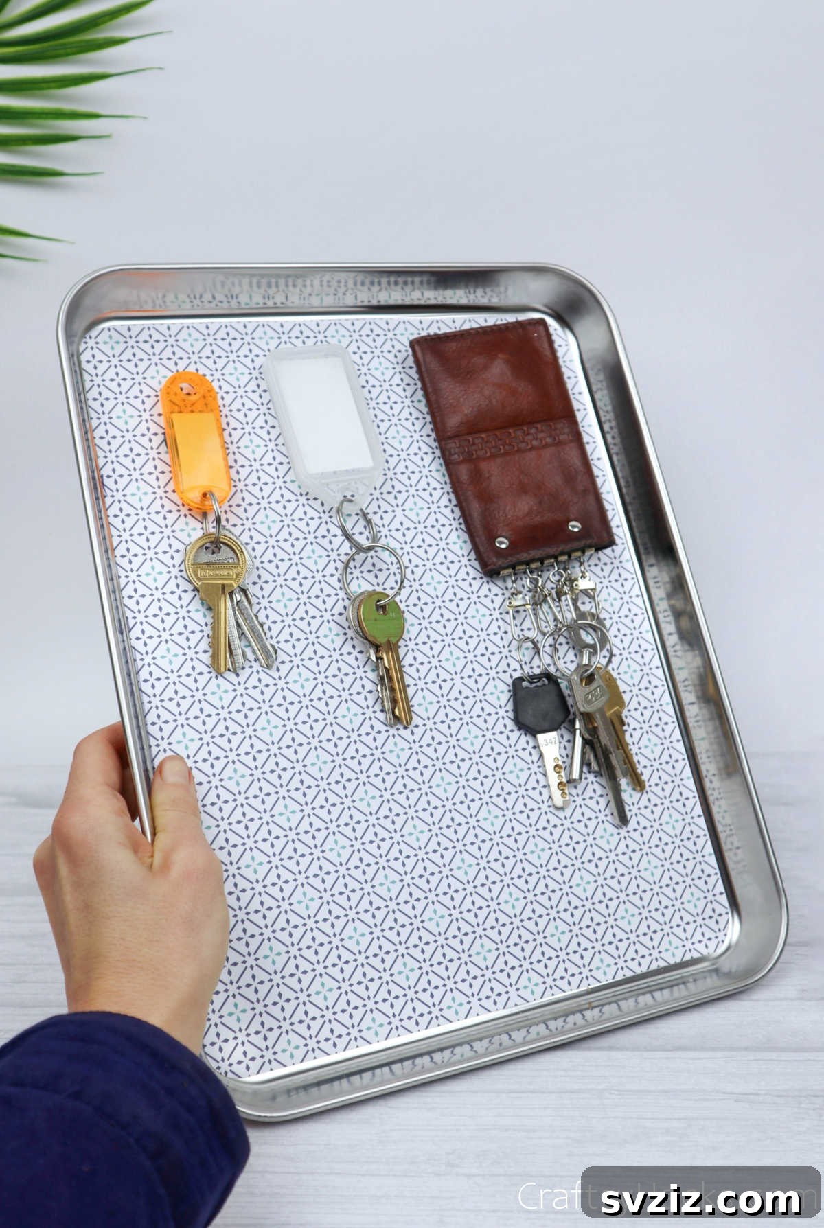 Organized keys and accessories on a decorative magnetic board
