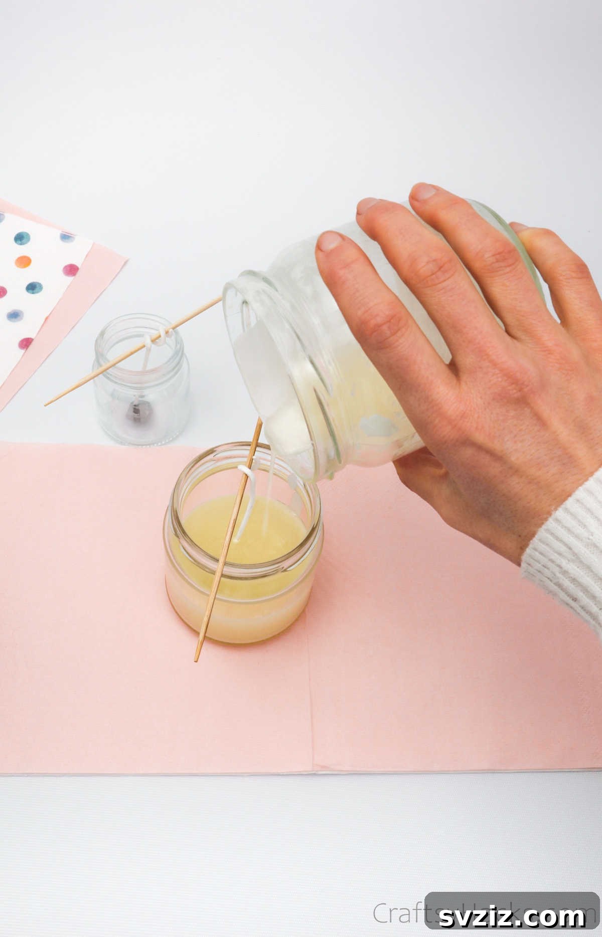 Crafting Your Signature Scented Candles 11 pouring wax into jar