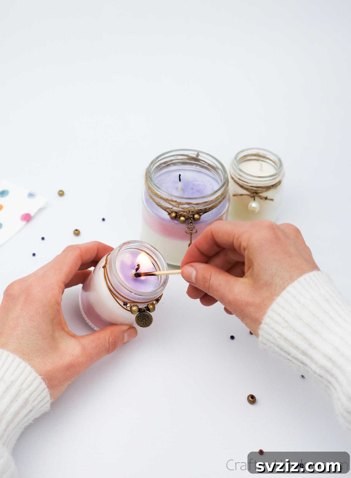 Crafting Your Signature Scented Candles 3 lighting a candle