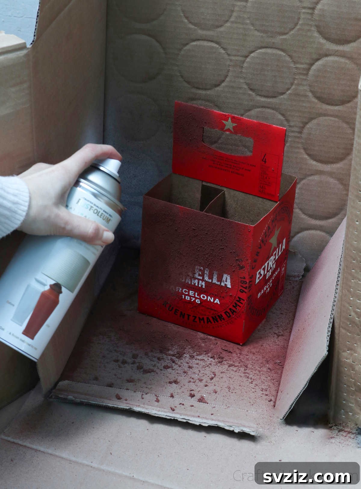 Spray painting the cardboard beer caddy