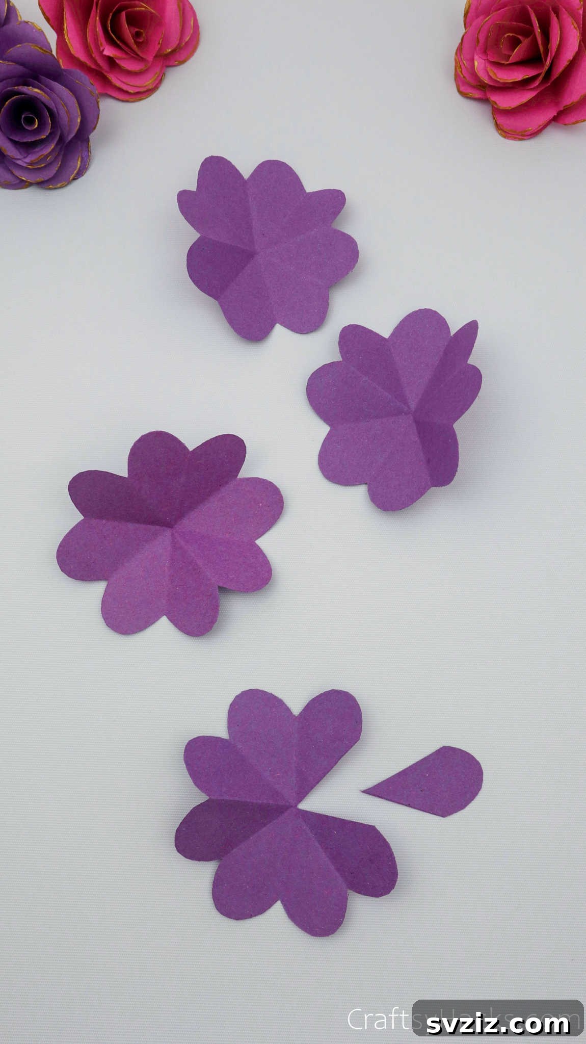 Crafting Beautiful Paper Blooms 14 Four distinct purple paper flower cutouts, each with one petal removed, ready for layering