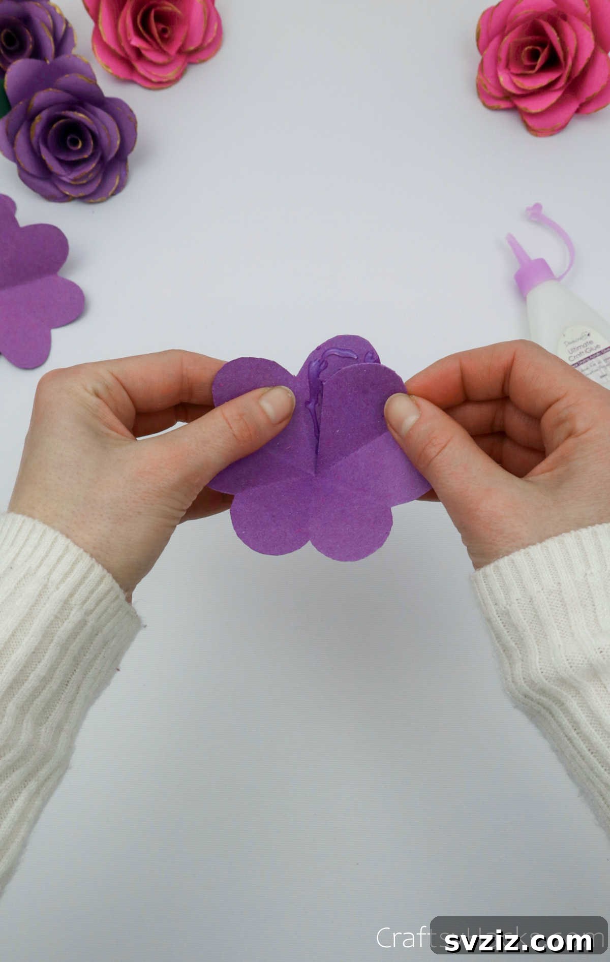 Crafting Beautiful Paper Blooms 18 Overlapping and gluing the edges of a paper petal to form a curved layer