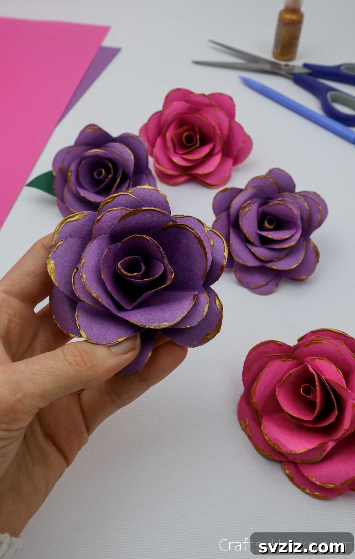 Crafting Beautiful Paper Blooms 32 A hand proudly holding a beautifully finished paper flower, ready for display