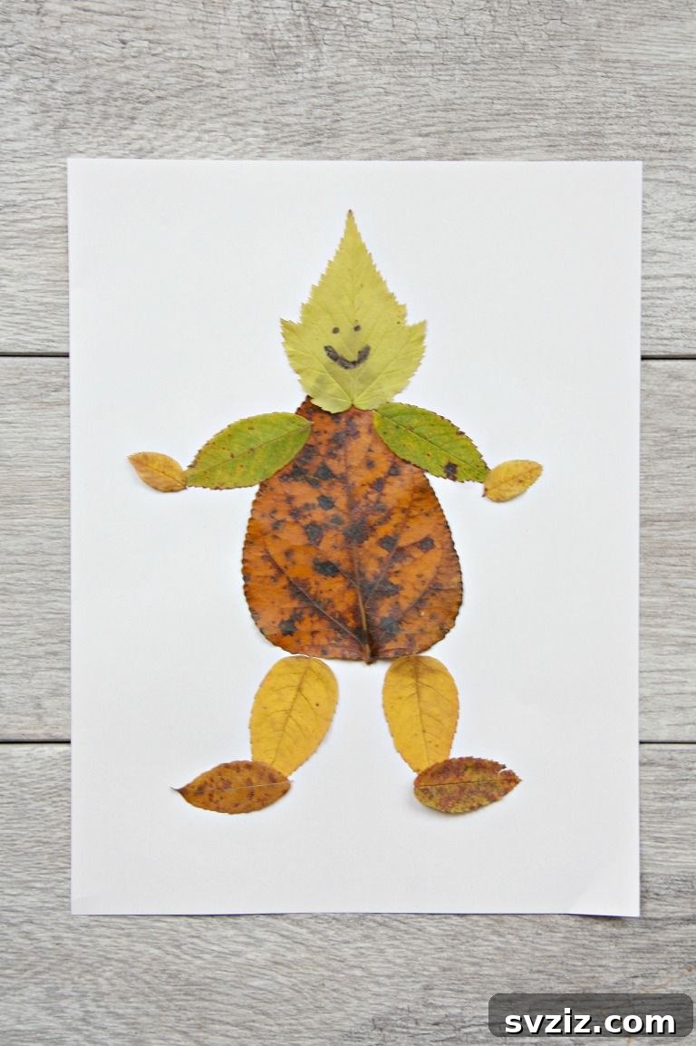 Kids creating unique leaf people figures with natural leaves and markers.