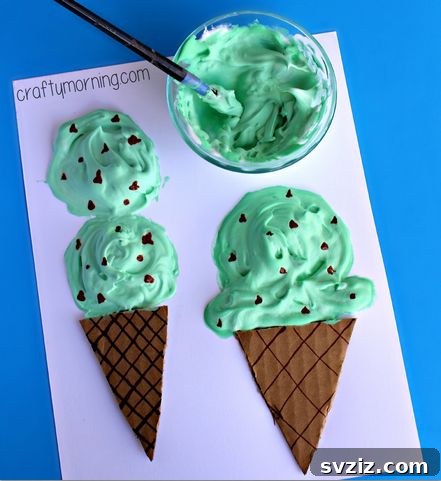 Kids creating realistic-looking ice cream cones with puffy paint.