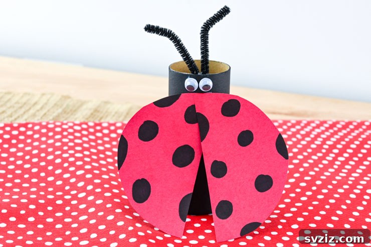 Children making adorable ladybugs from toilet paper rolls.