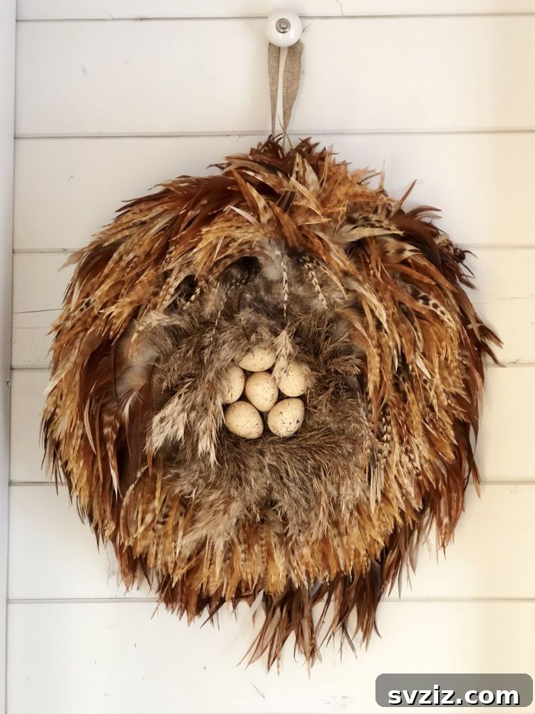 27 Creative DIY Fall Wreath Designs 16 Textural Feather Wreath in autumn earth tones