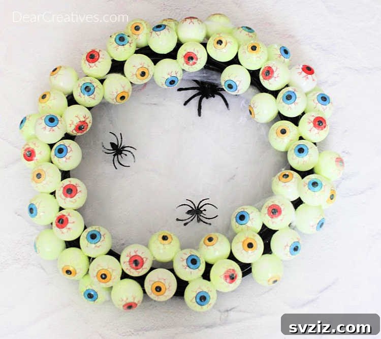 27 Creative DIY Fall Wreath Designs 20 Ghoulish Eyeball Wreath for a truly spooky Halloween