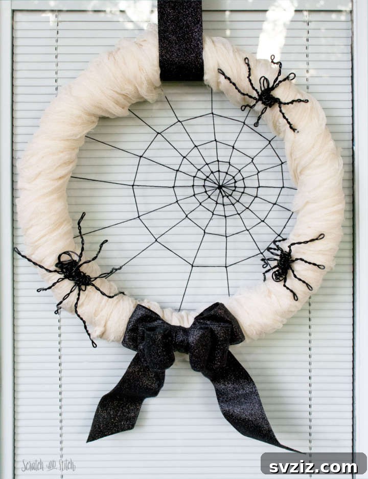 27 Creative DIY Fall Wreath Designs 28 Spooky Spiderweb Halloween Wreath with faux spiders