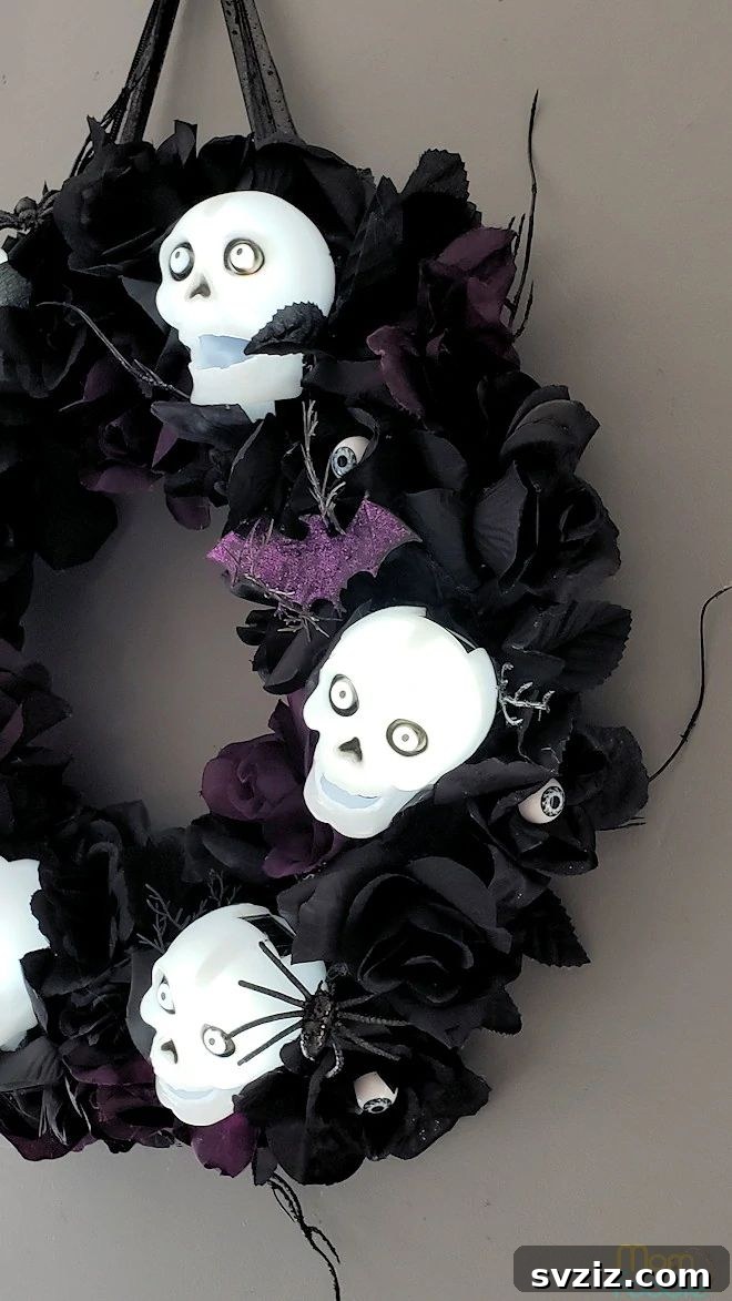 27 Creative DIY Fall Wreath Designs 5 Spooky Solar Skull and Roses Wreath for Halloween