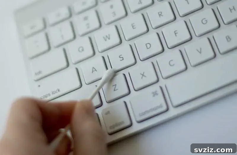 20 Brilliant Hacks for a Sparkling Spring Clean 17 Clean and Sanitize Keyboard with Cotton Swabs