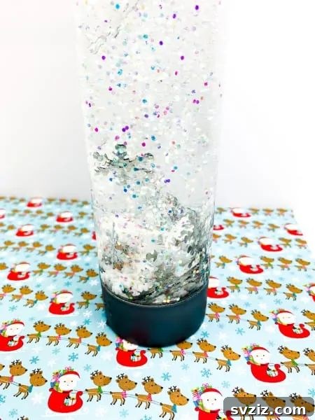 Kids' winter sensory bottle with fake snow and glitter.