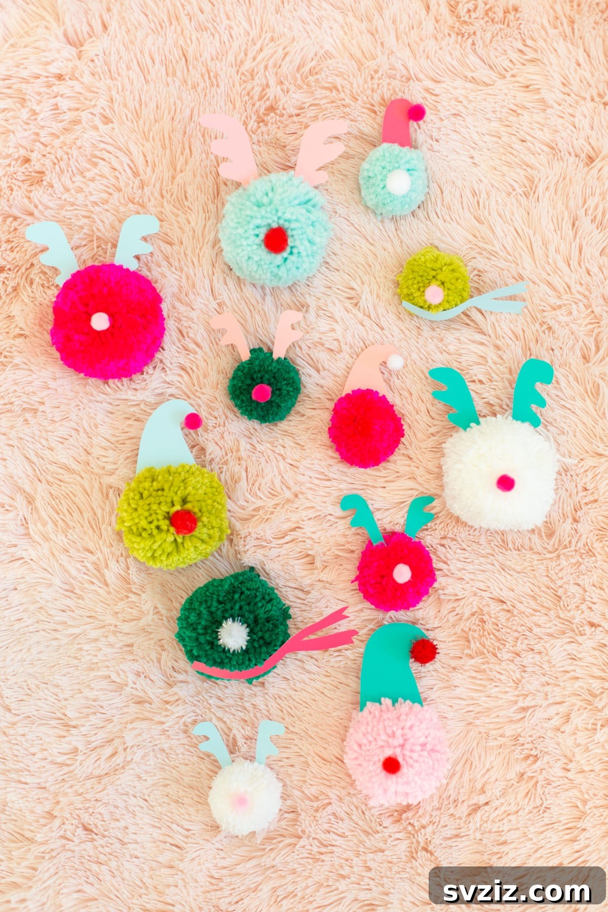 Handmade pompom reindeer ornaments for Christmas.