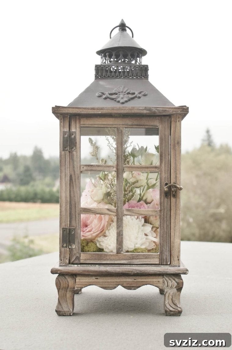 Fresh Farmhouse Spring Decor Ideas 16 Farmhouse Spring Lantern with Floral Arrangement