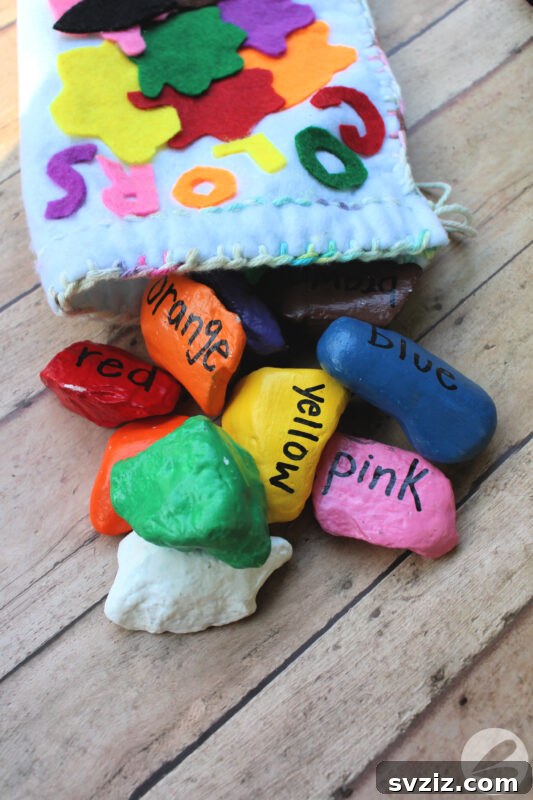 Tiny Treasures: 41 Adorable Rock Painting Ideas 11 Colorful Rainbow Mix And Match Rocks for learning and play.