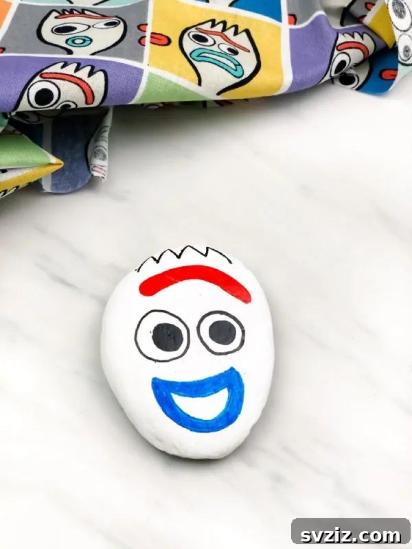Tiny Treasures: 41 Adorable Rock Painting Ideas 13 Whimsical Forky Painted Rocks, inspired by Toy Story for kids.