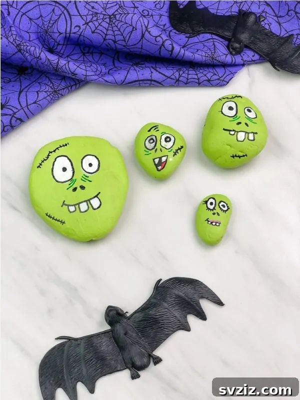 Tiny Treasures: 41 Adorable Rock Painting Ideas 15 Spooky yet fun Zombie Halloween Painted Rocks for kids.