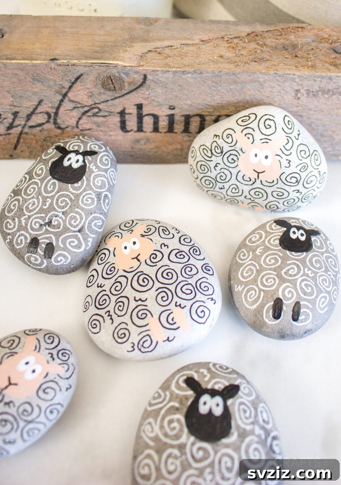 Tiny Treasures: 41 Adorable Rock Painting Ideas 22 Adorable Sheep Painted Rocks with whimsical woolly textures.