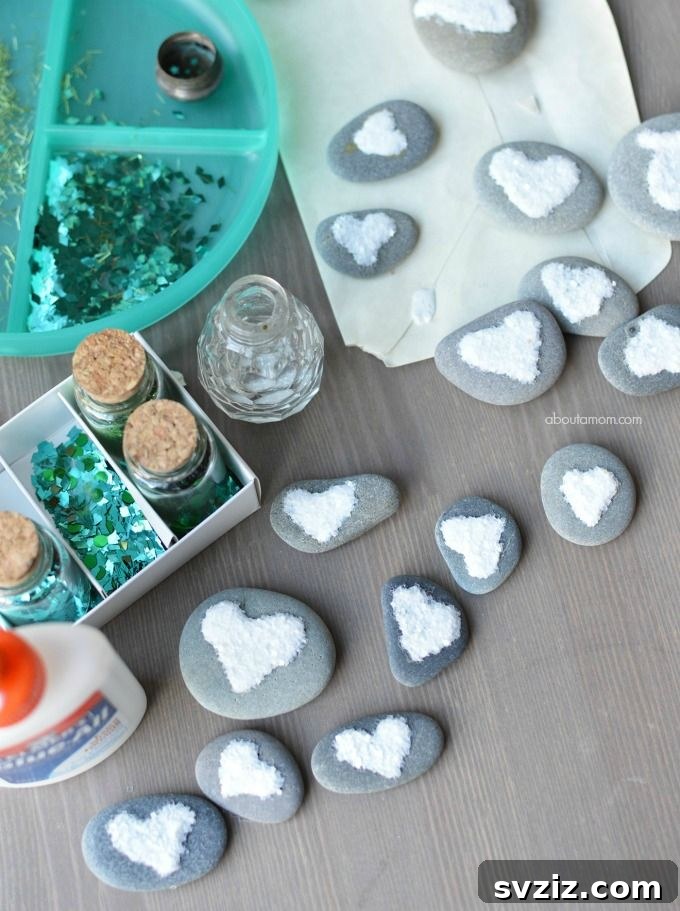 Tiny Treasures: 41 Adorable Rock Painting Ideas 30 Sparkling Glittery Heart Rock Craft, perfect for expressing love.
