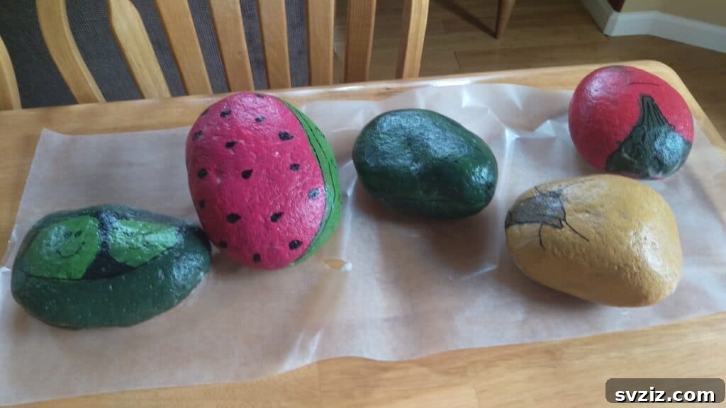Tiny Treasures: 41 Adorable Rock Painting Ideas 34 Practical DIY Garden Rock Markers for organized plant labeling.