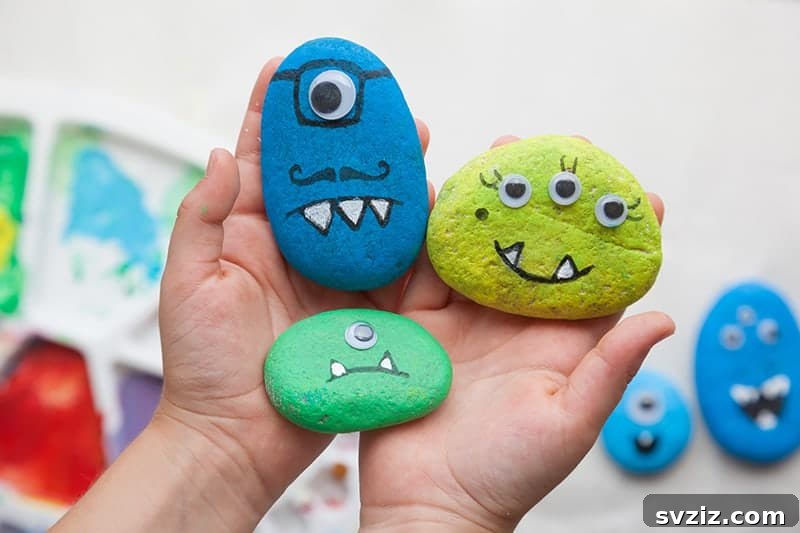 Tiny Treasures: 41 Adorable Rock Painting Ideas 43 Whimsical Monster Rock painting for kids, full of character.