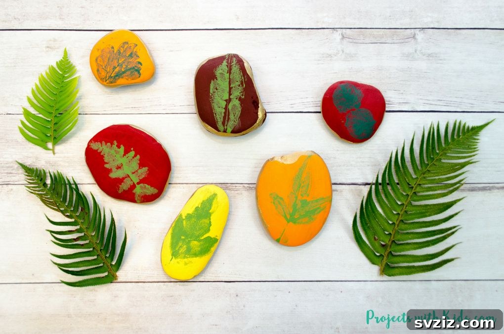 Tiny Treasures: 41 Adorable Rock Painting Ideas 6 Autumn Leaf Painting on rocks, capturing the essence of fall.