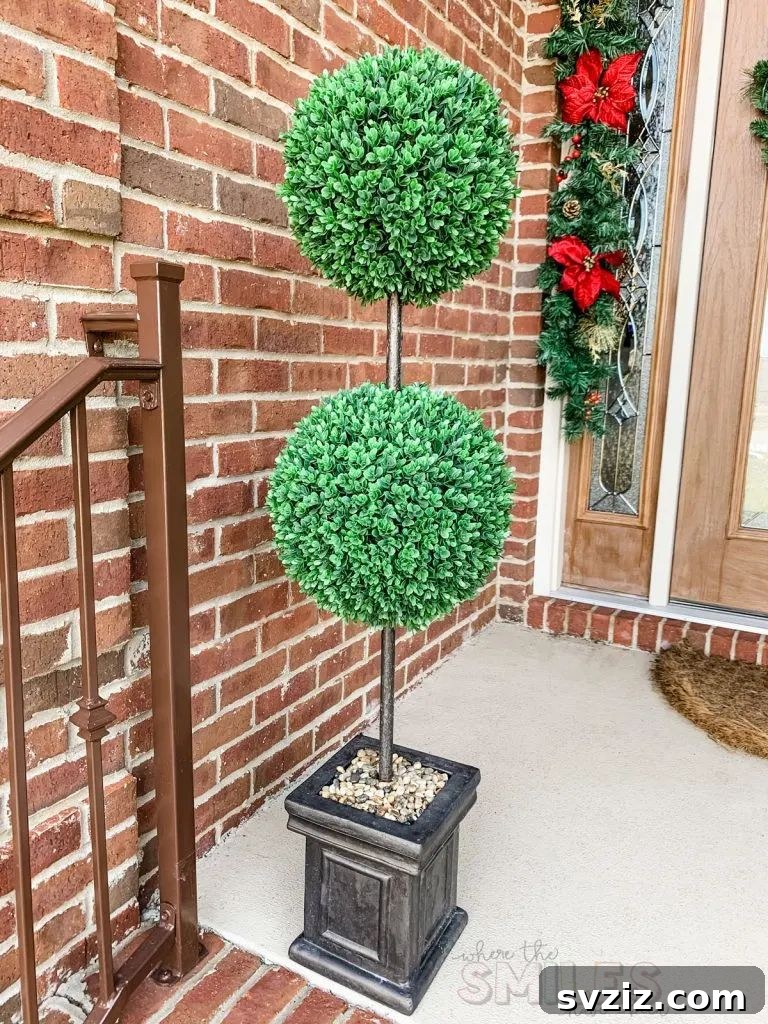 Dazzling Christmas Decor Ideas to Transform Your Home 7 Topiary Snowman Porch Decor