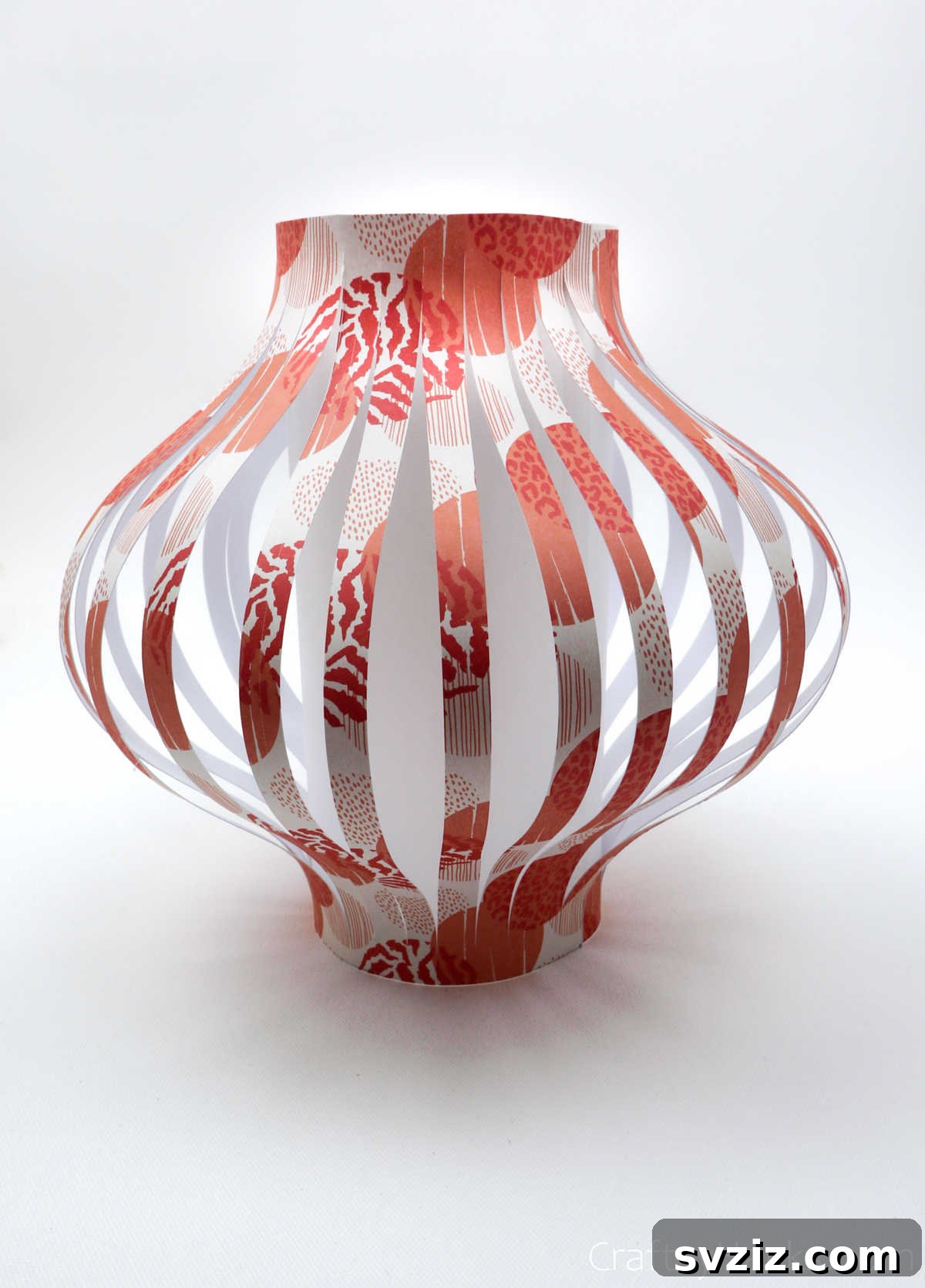 Craft Your Own Stunning Paper Lanterns 19 The assembled paper lantern stands upright, with its ends neatly taped together, forming a sturdy cylinder.