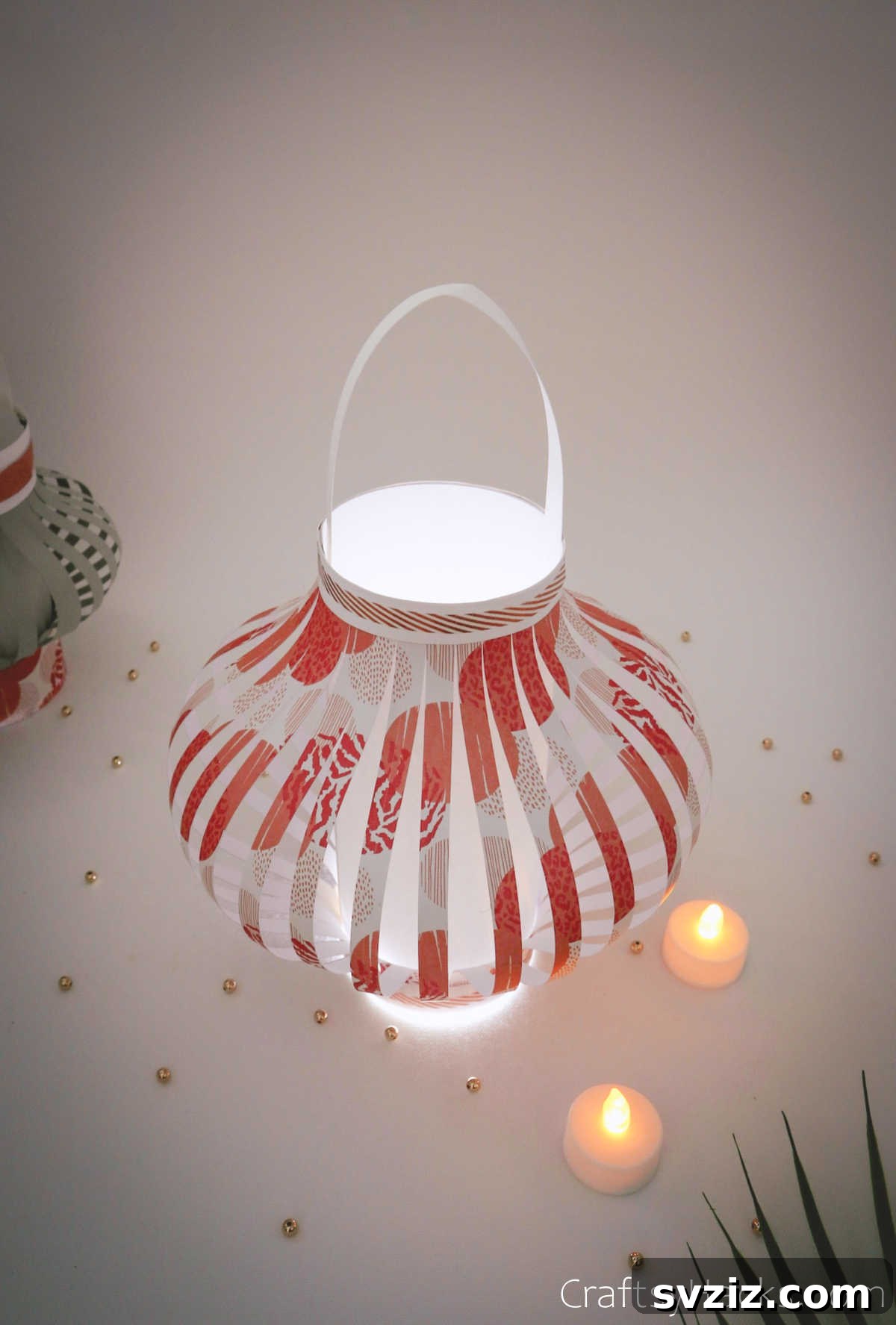Craft Your Own Stunning Paper Lanterns 27 A stunning paper lantern glowing brightly, illuminating its intricate patterns and adding a touch of elegance to its surroundings.