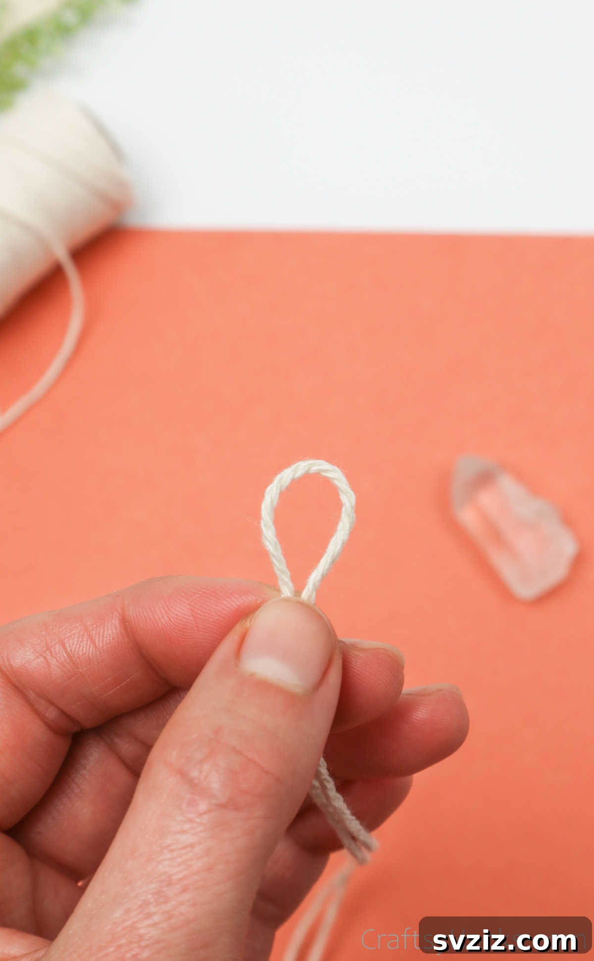 Simple Stone Necklace DIY Guide 12 Another view of the string loop around the crystal, demonstrating the snug fit