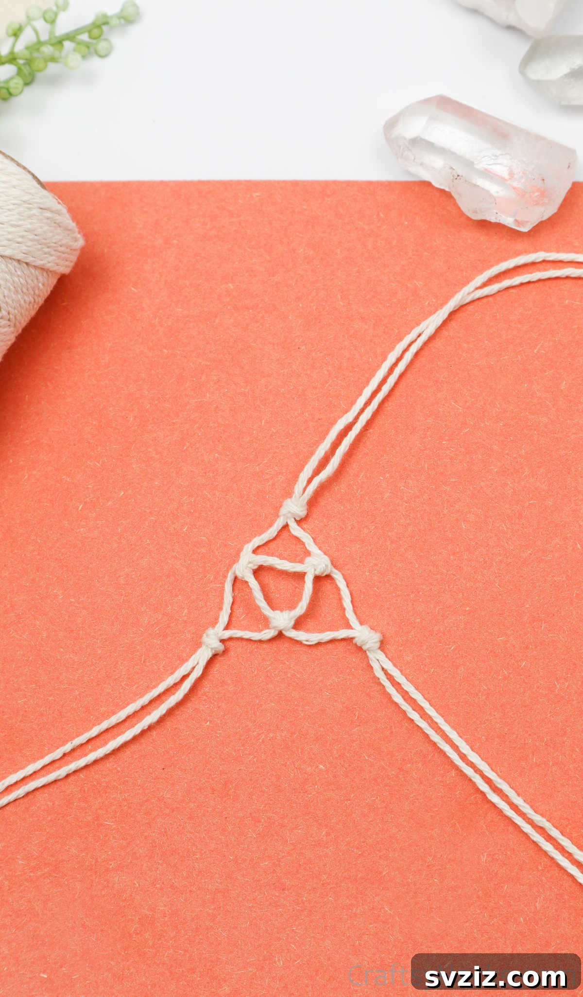 Simple Stone Necklace DIY Guide 29 The macrame design curving upwards around the crystal, showing the evolving three-dimensional structure