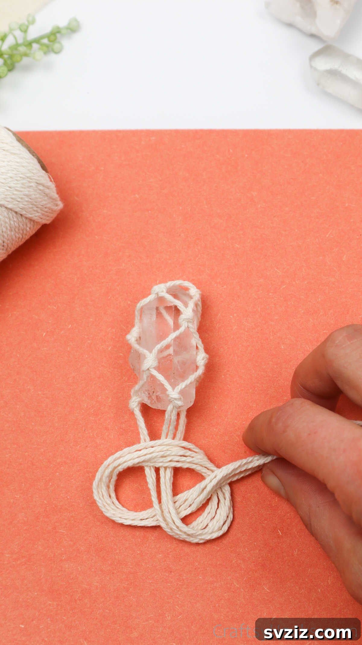 Simple Stone Necklace DIY Guide 36 All six cords gathered and being looped together to form the final top knot above the crystal