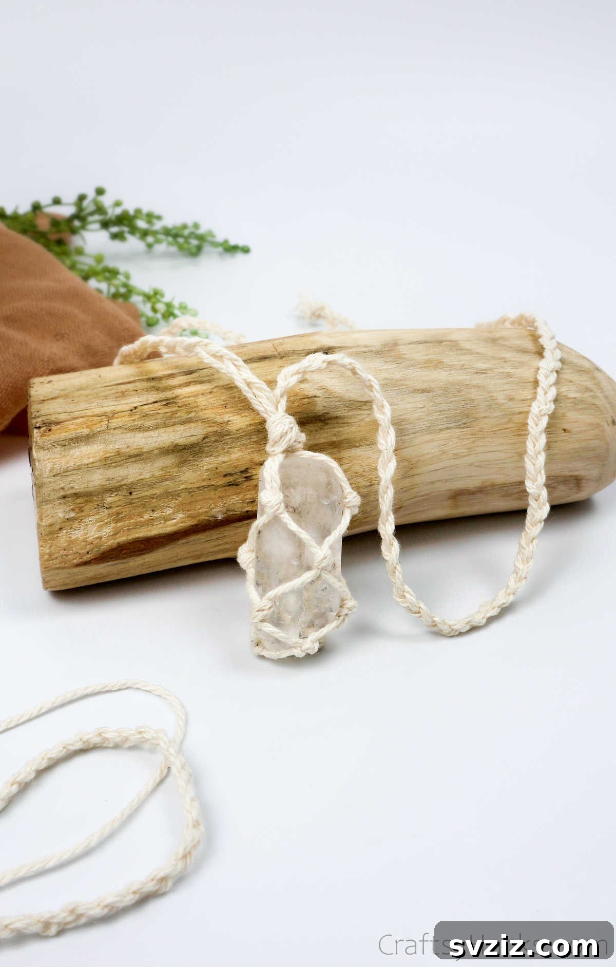 Simple Stone Necklace DIY Guide 42 A completed DIY macrame necklace with a natural stone pendant, ready to be worn